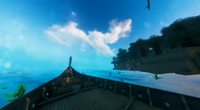 the longship's bow coming up to a beach