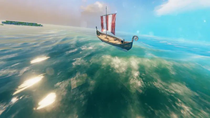 the longship sailing over glittering water